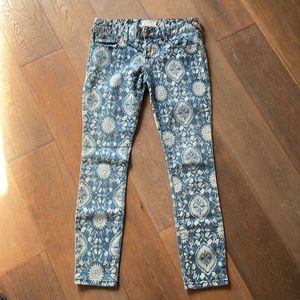 Free People bandanna print jeans.